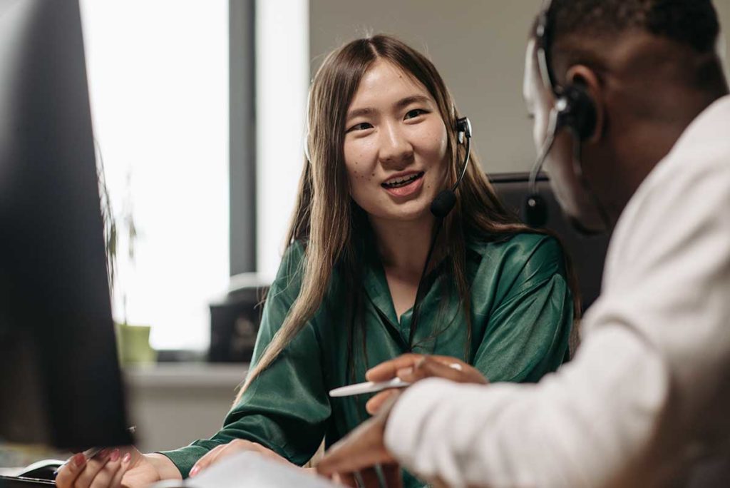Two People Working In Customer Service